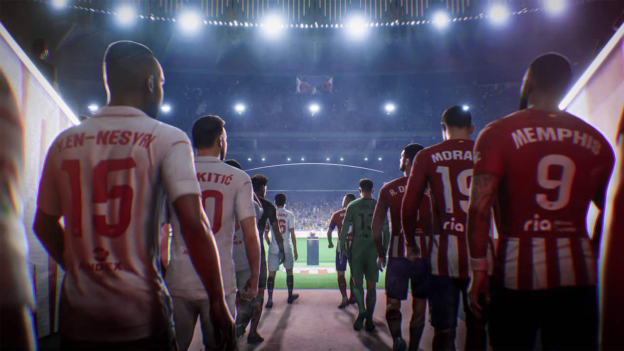 Screenshot from EA Sports FC 24 showing two teams walking out onto the football pitch.