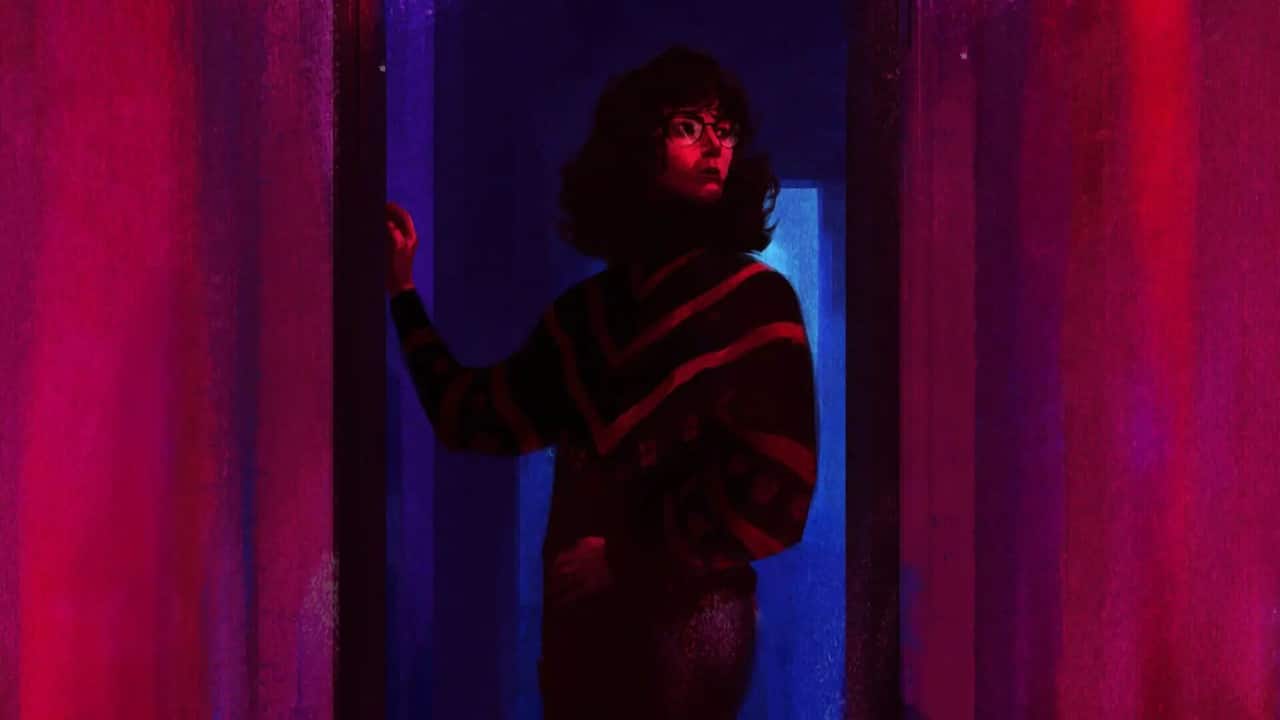 A screenshot from Saturnalia of a person backlit in an eerie doorway.