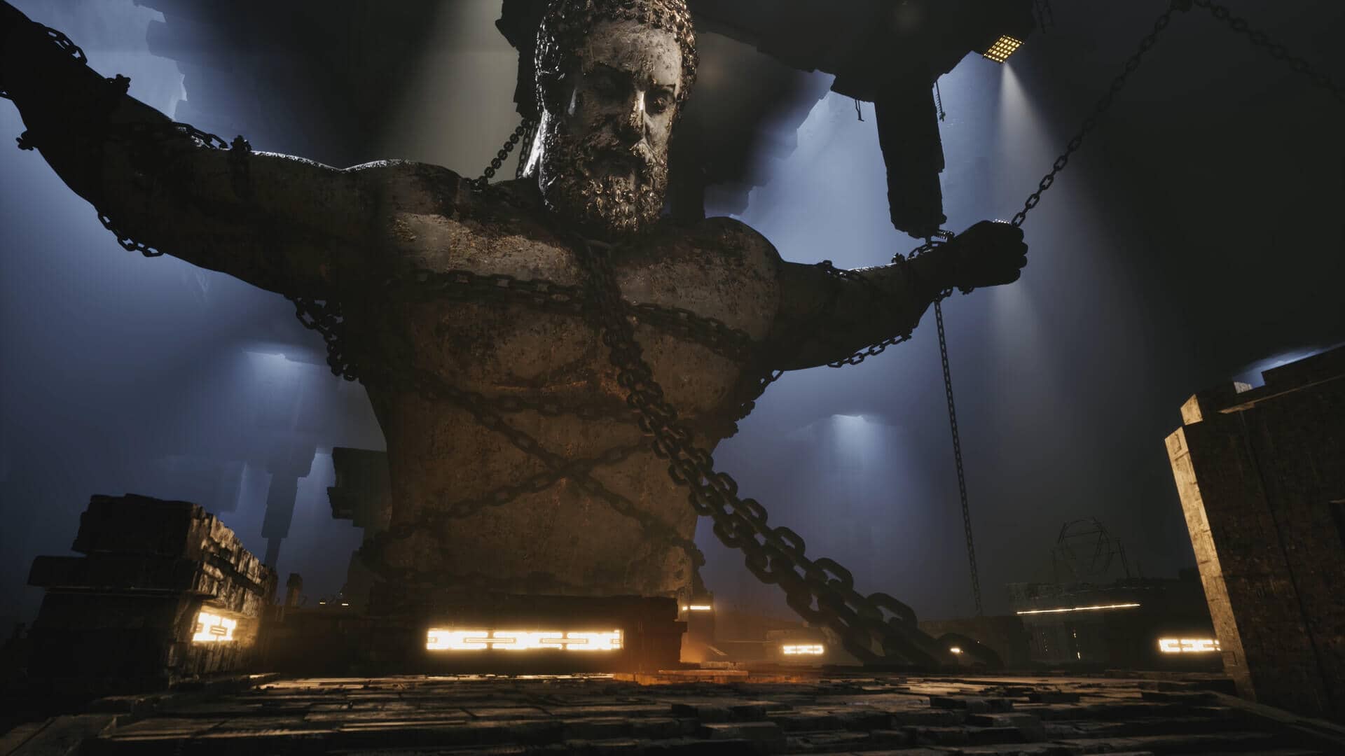 Screenshot of The Talos Principle 2 showing a massive stone statue wrapped in chains.